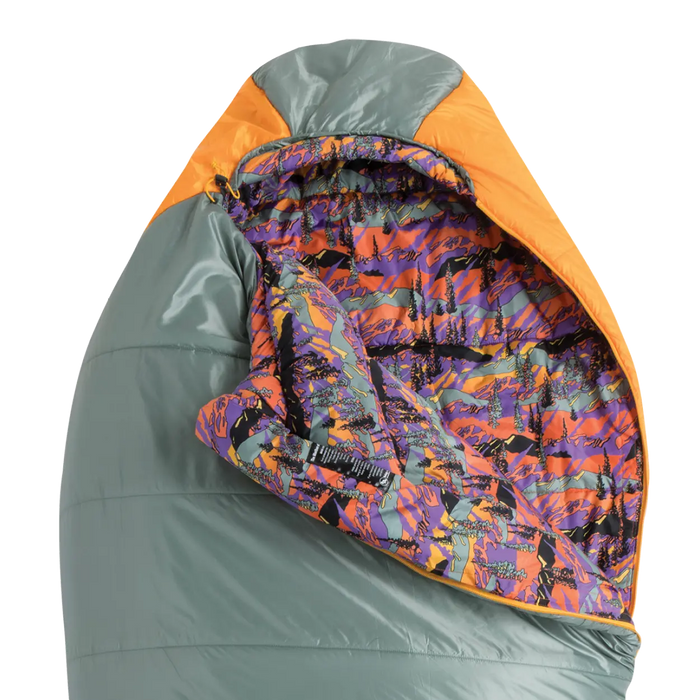 Colorful sleeping bag with gray and orange exterior on a white background