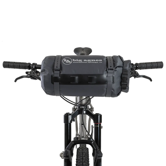 Bicycle with handlebar bags on a white background