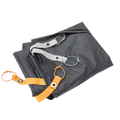 Folded gray Copper Spur UL1 Bikepack Footprint with orange and silver straps on a white background