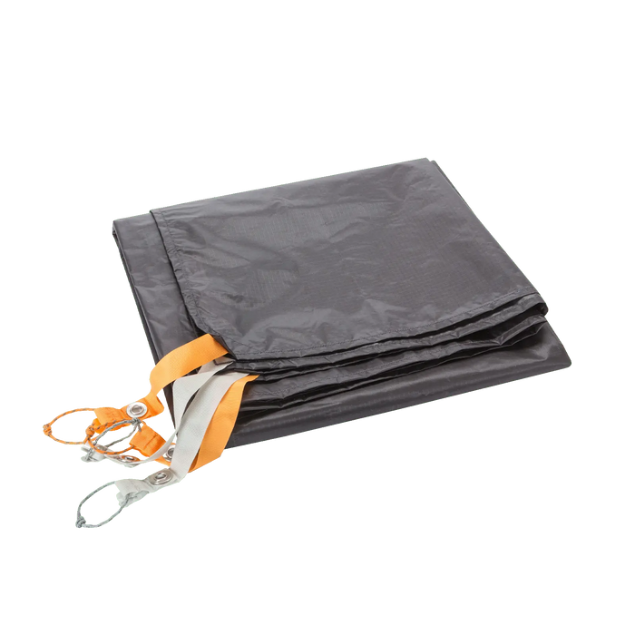The Big Agnes Copper Spur UL2 XL Footprint is a folded gray tarp with orange and gray straps and metal clips, shown on a white background—perfect for protecting your tent floor.