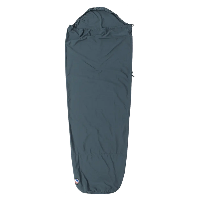The Big Agnes Cotton Sleeping Bag Liner features a dark gray, mummy-style design with a hood, tapering toward the bottom, and a small logo near the foot—laid flat on white. Ideal for travel comfort.