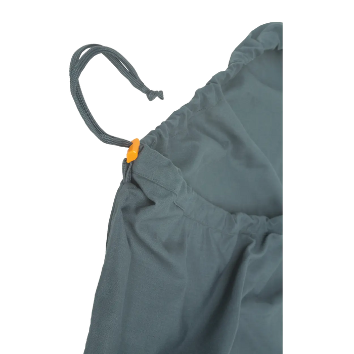 Close-up of the Big Agnes Cotton Sleeping Bag Liner—gray fabric bag with an orange plastic toggle, ideal as a travel companion or for storing your sleeping bag, with the drawstring partially pulled through its edge channel.