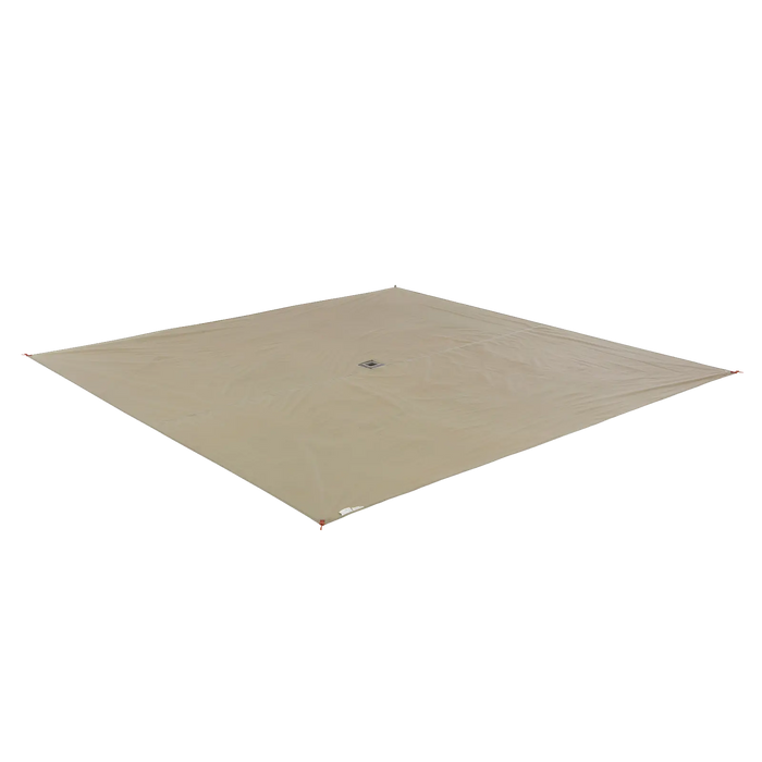 A large, square, beige Big Agnes Gold Camp 5 Footprint is laid flat on a white background. It has reinforced corners and a small logo near the center, providing durable ground protection for lightweight backcountry shelter setups.
