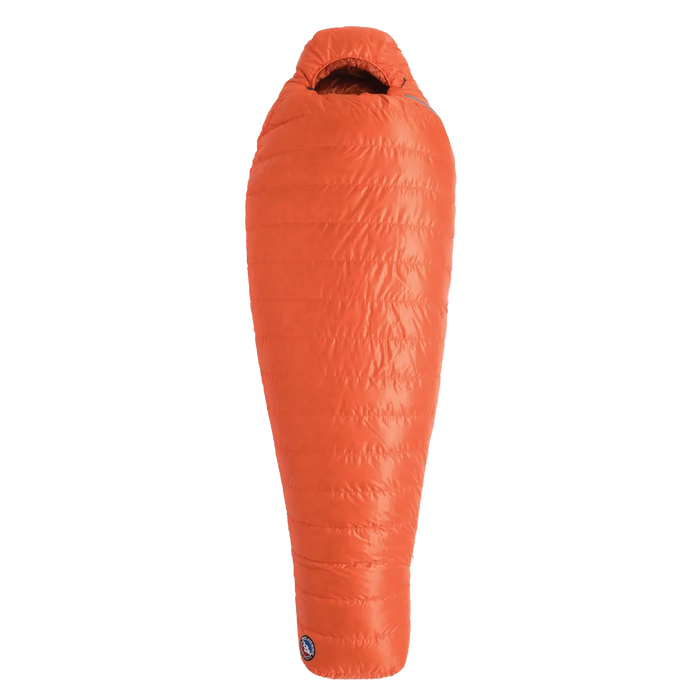 The Big Agnes Greystone 20° is a bright orange, mummy-style sleeping bag with DownTek insulation and a hood, shown vertically against a white background—ideal for backpacking adventures.