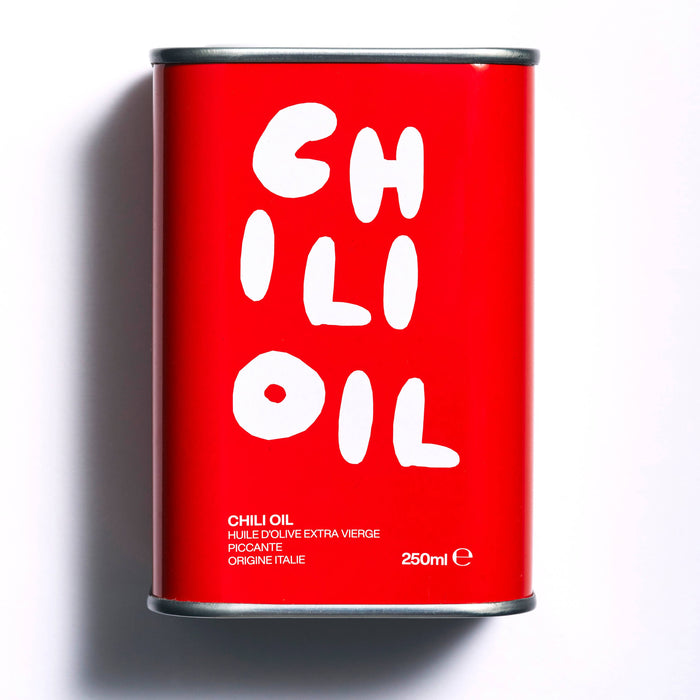 olea pia - italian chili oil tin on white background - winter's moon