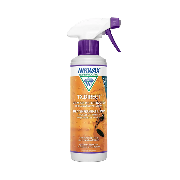 Big Agnes Nikwax TX Direct Spray-On Waterproofing 10 oz. restores water-repellency to synthetic outerwear, with an orange label, water droplets, and a purple spray nozzle.