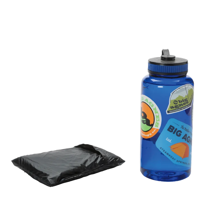 A folded black Pitchpine VST 1.5 Footprint from Big Agnes sits beside a blue water bottle with colorful outdoor-themed stickers, both placed on a plain white background.