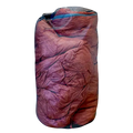 A Big Agnes Sleeping Bag Mesh Storage Sack filled with wrinkled red fabric stands upright against a plain white background.
