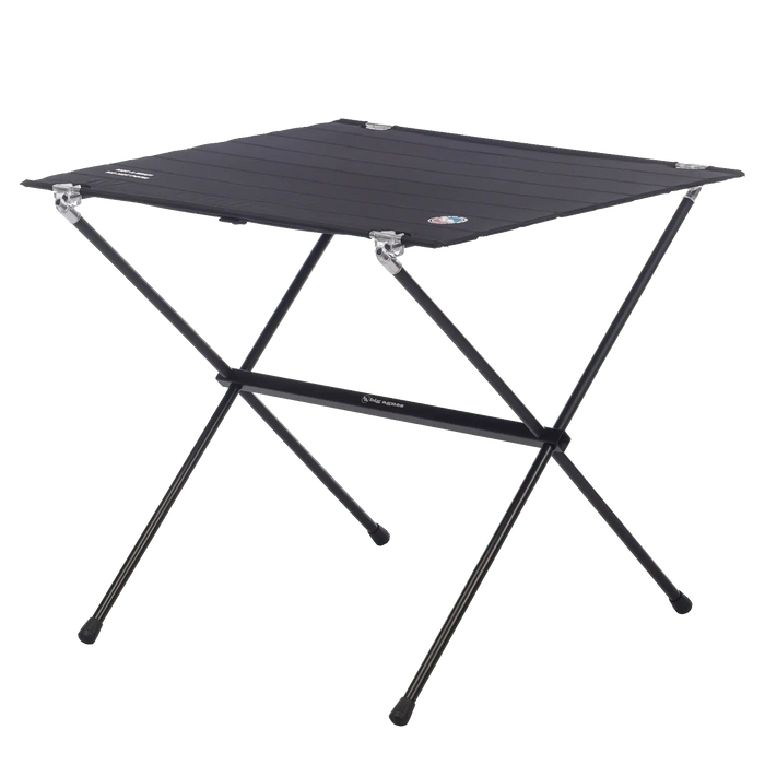 The Big Agnes Soul Kitchen Camp Table is a lightweight, portable black camp table with a slatted top and crossed metal legs, ideal for campsite meals. Shown against a plain white background.