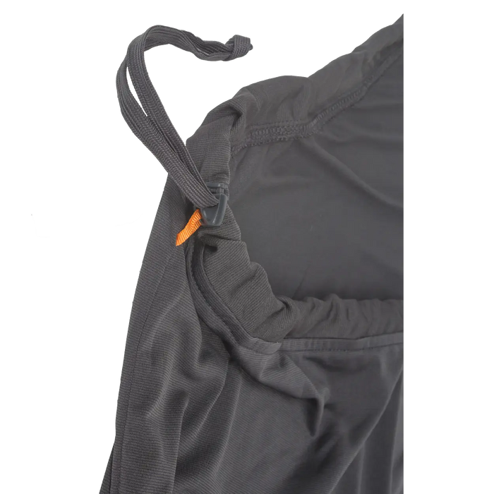 Close-up of the UL Recovery Sleeping Bag Liner by Big Agnes, featuring a dark gray fabric, elastic waistband with adjustable drawstring, small orange tag, and CELLIANT technology for enhanced comfort—ultralight like a liner.