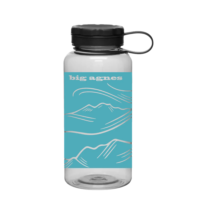 The Big Agnes Wide Mouth Water Bottle is BPA-free and features a black lid, a blue label with white mountain graphics, and the Big Agnes logo—making it your perfect adventure companion.