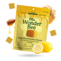 Packaging of Plant People Wonder Bee Superfood Honey Chews with honey, lemons, and pollen on a white background