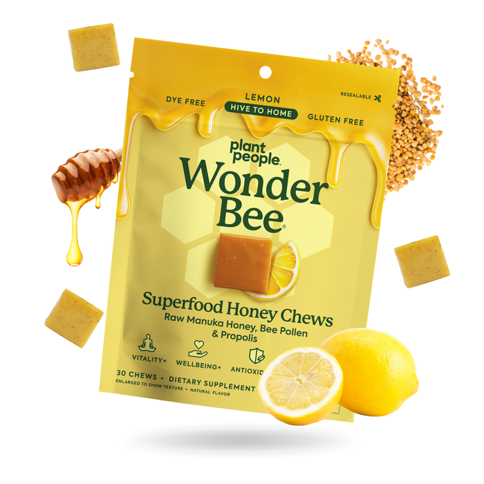 Packaging of Plant People Wonder Bee Superfood Honey Chews with honey, lemons, and pollen on a white background