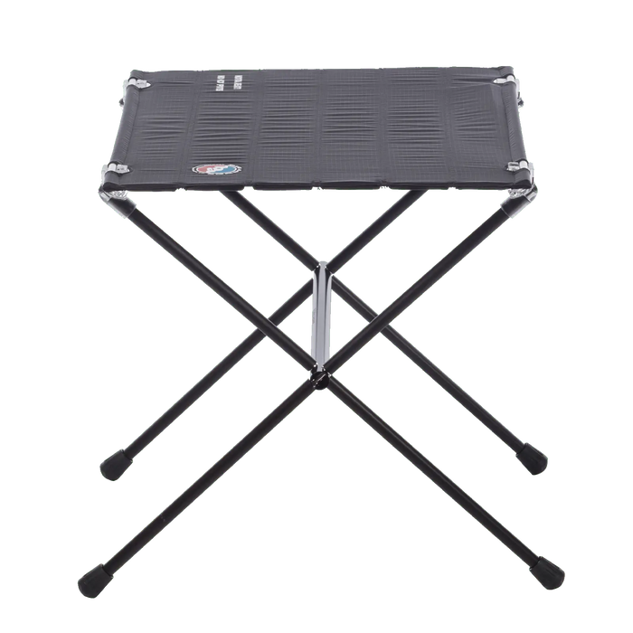 A lightweight, foldable black camping stool with a flat rectangular seat and crossed metal legs is shown paired with the Big Agnes Woodchuck Camp Table against a plain white background.