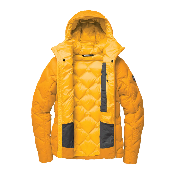Yellow quilted jacket with black accents on a white background