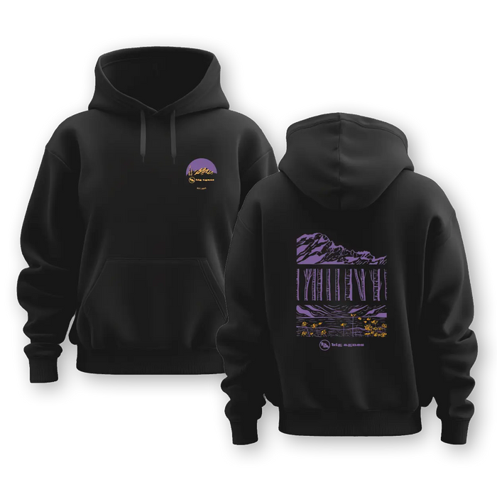 The Big Agnes M's Zirkel Triptych Hoodie is a black heavyweight limited edition, shown front and back. It features a small purple and yellow mountain sunset on the chest and a large scenic landscape in matching tones on the back.